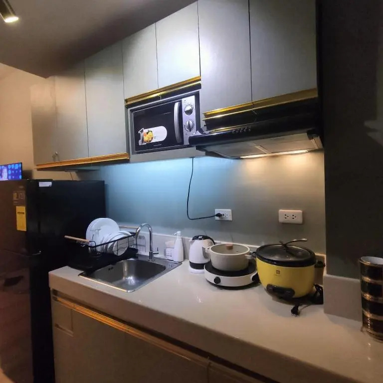 OYO 936 Yumis Condotel Trees Residences