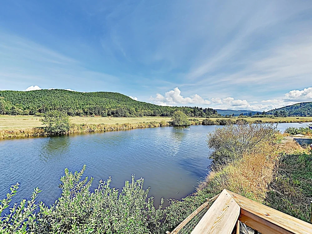 New Listing! Spacious Riverfront Gem W/ Firepit 3 Bedroom Home