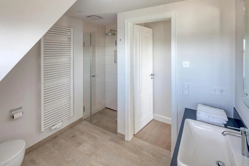 Rantum Dorf - Ferienappartments im Reetdachhaus 3 & 4