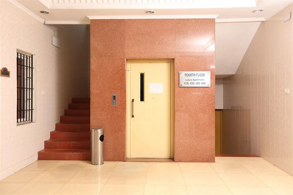 Blossoms Hotel & Service Apartments