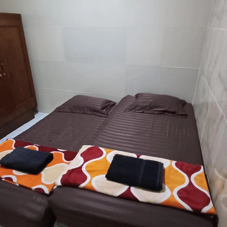 Spot On 3988 Kost Carmelia Baranangsiang Syariah