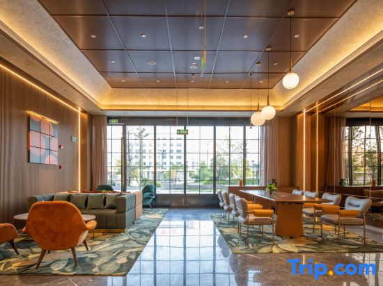 Orange Hotel (Yibin West Railway Station WanXiang World)