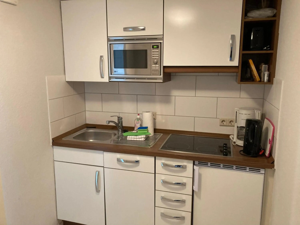 Ferienwohnung 4 Rosenbogen - Familienwohnung mit Wintergarten und Terrasse