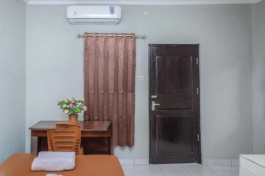 Amor Homestay near Eltari International Airport Mitra RedDoorz