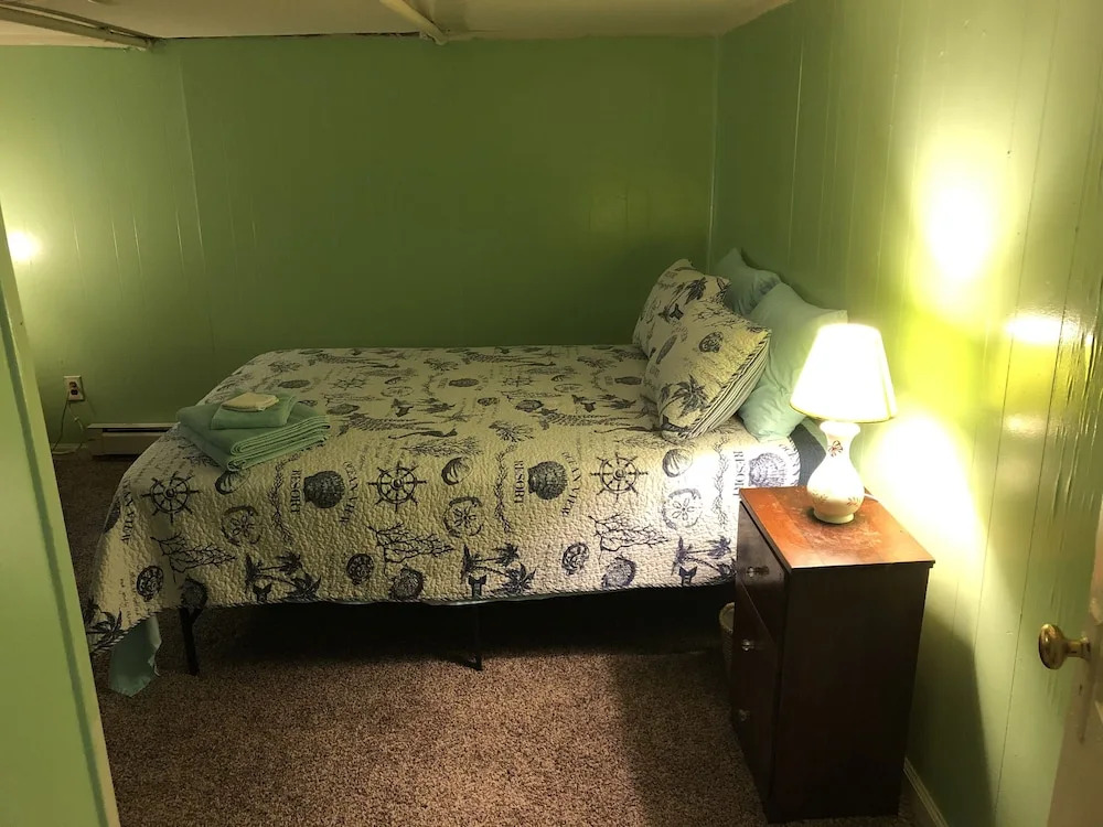 Rustic Beach Front Basement Apt, Pet Friendly Wi-fi 2 Bedroom Apts by RedAwning