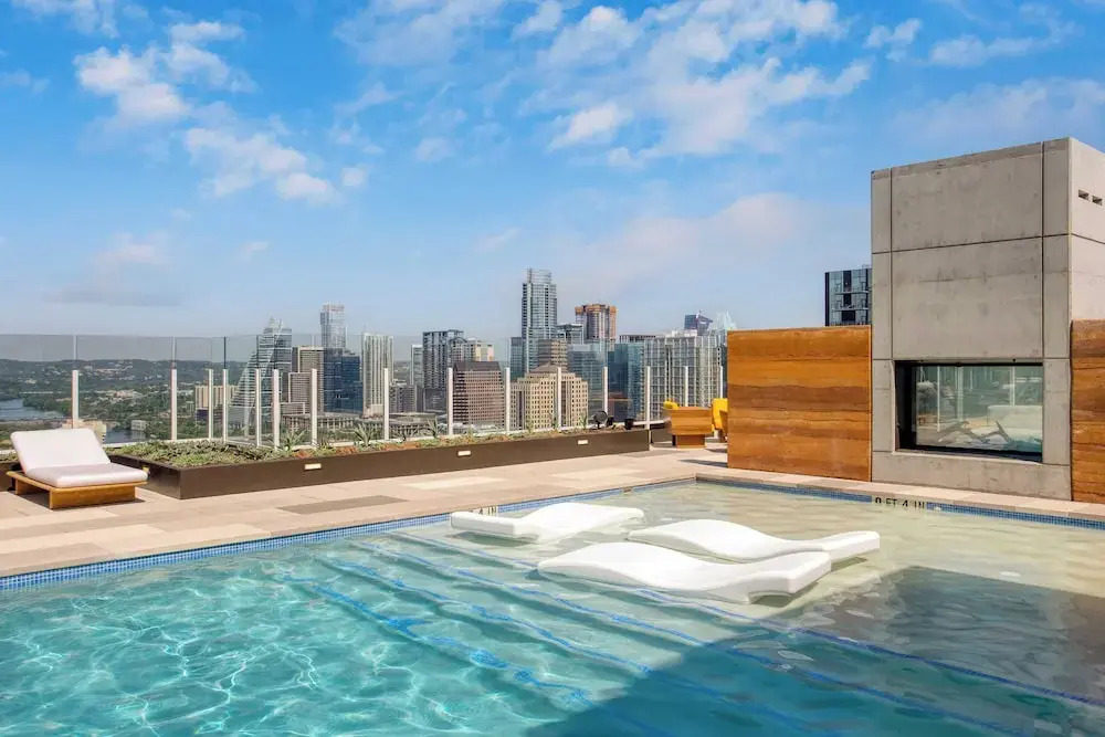 Sleeps 34! 11 Condos in New Austin High Rise w/ Rooftop Pool, Gym, Yoga Studio