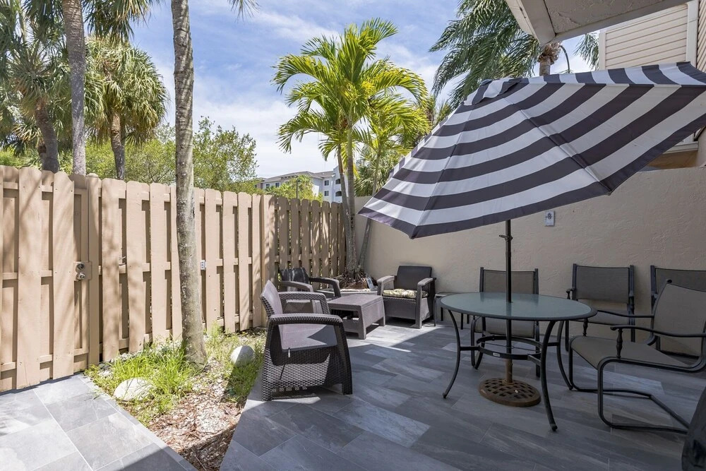 Cozy Minium In Quiet Gated Community In Palm Beach Lakes 2 Bedroom Condo by RedAwning