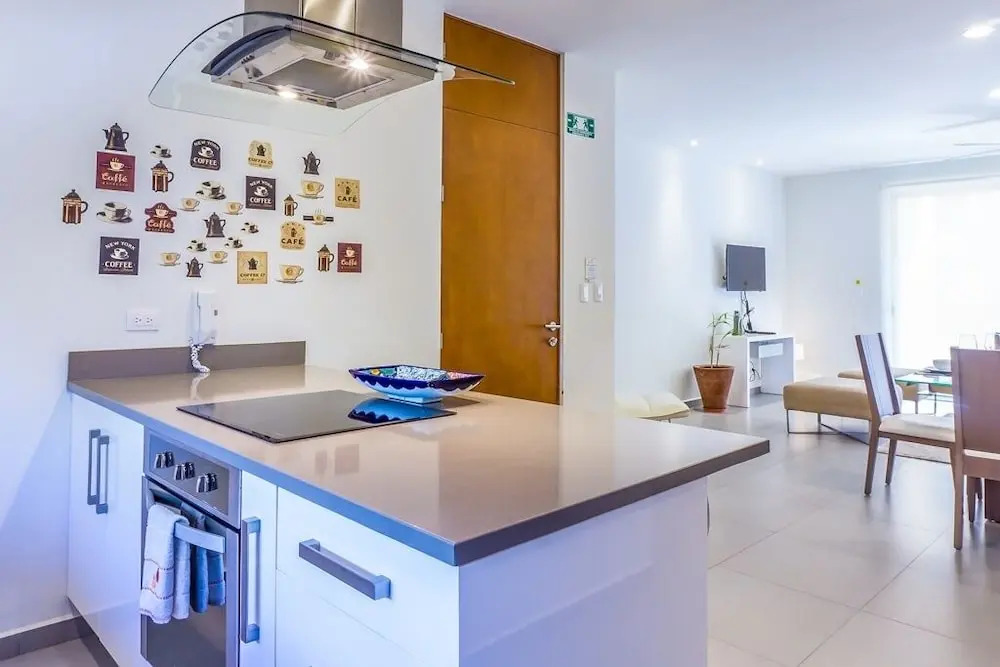 Lunada 314 Modern Playa del Carmen Condo with Tropical Garden View by RedAwning