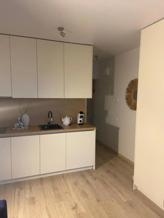 E&K apartamentai su šildomu baseinu kieme