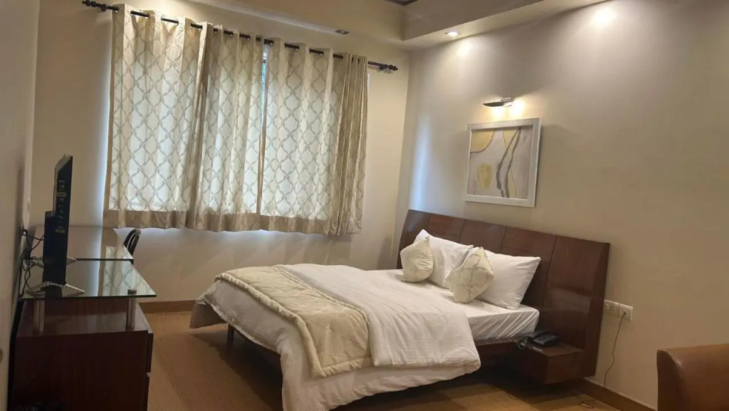 Enkay Suites - DLF CyberCity