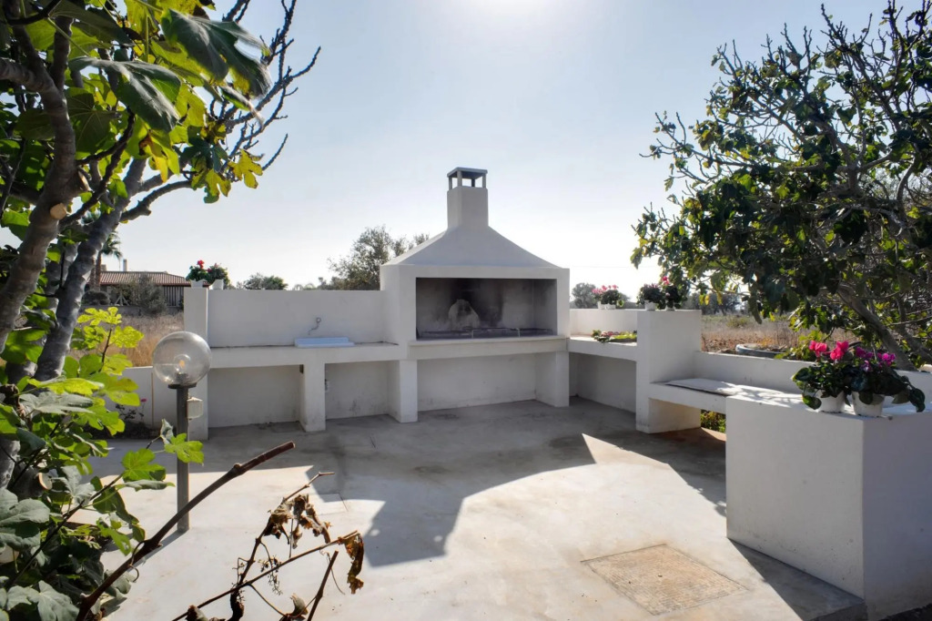 Typical property with swimming pool completely surrounded by secular olive trees and Mediterrean maq-VILLATRULLO MELOGRANO