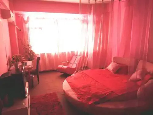Tangtang Theme Apartment Holiday Hotel