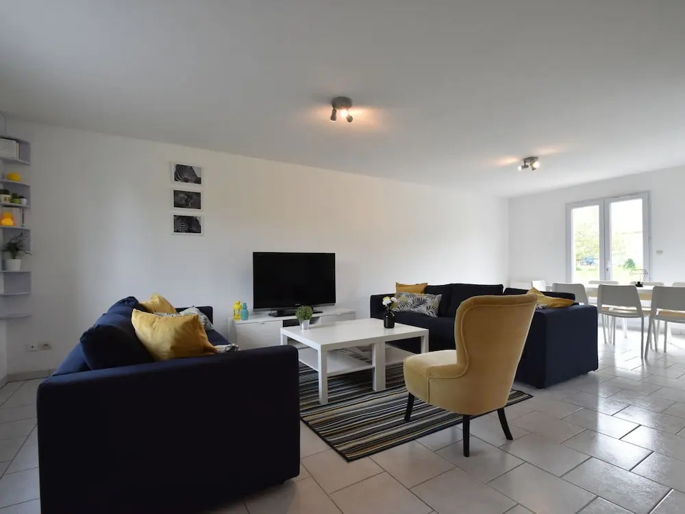 Sleek, Modern and Spacious Villa With the Invasion Beaches in the Back Garden