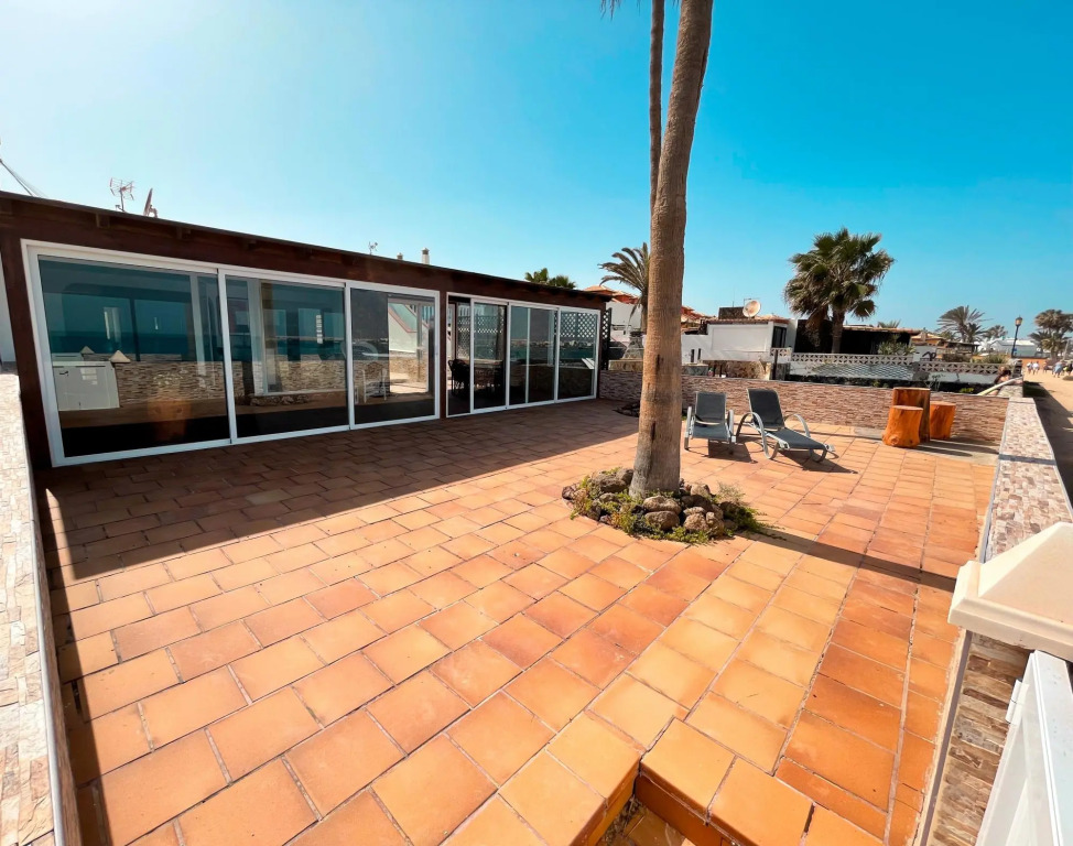 Beachfront Villa San Antonio with Private Heated Pool BBQ in the Heart of Corralejo by Amazzzing Travel