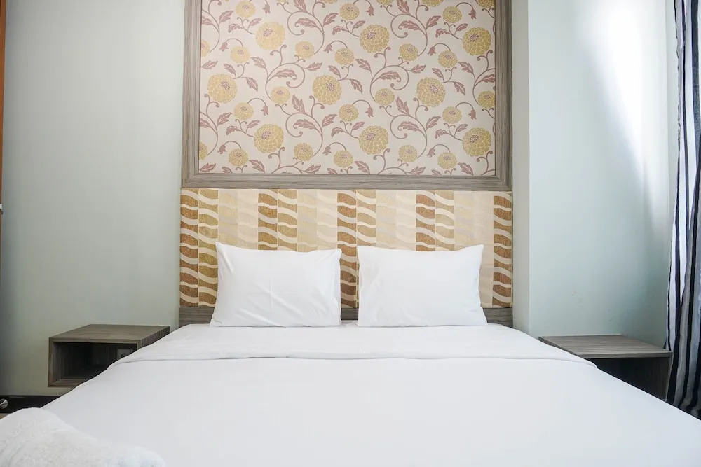 Best Location and Cozy 2BR The H Residence Apartment By Travelio