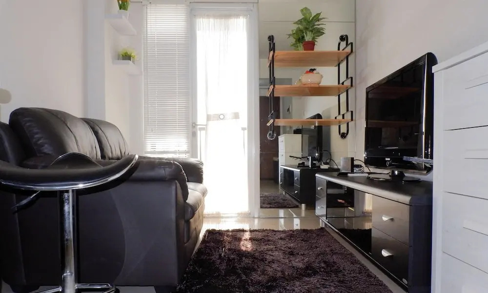 Homey and Minimalist Signature Park Grande Apartment