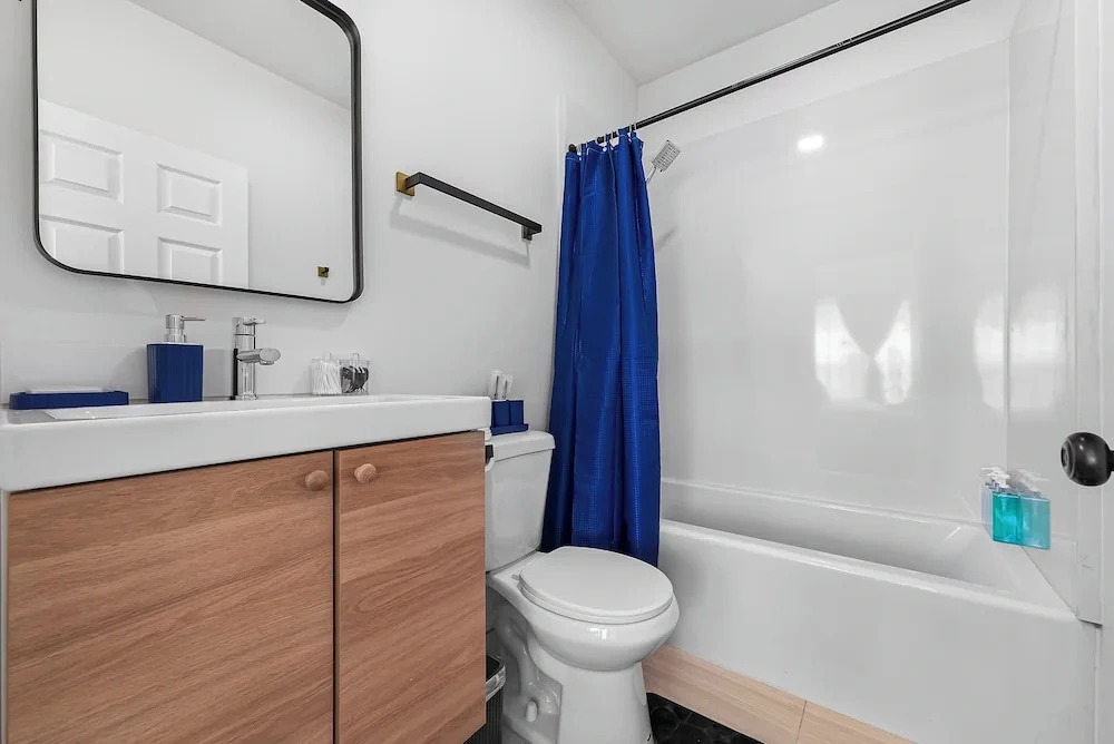 Spacious 8BR Home with AC & Parking