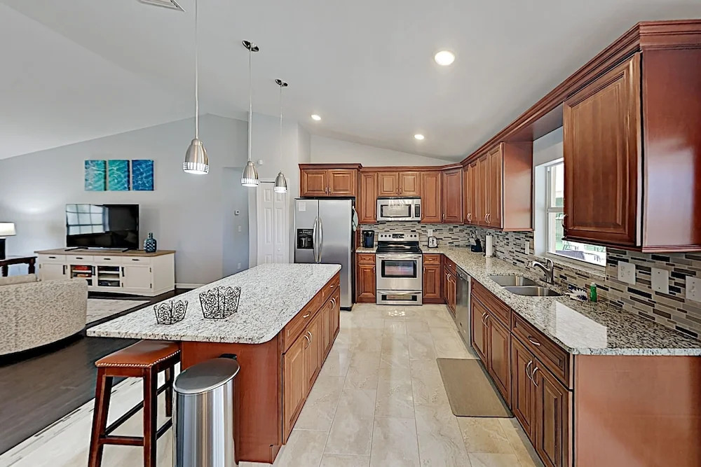 Stylish Tropical Getaway W/ Pool & Oversized Yard 3 Bedroom Home