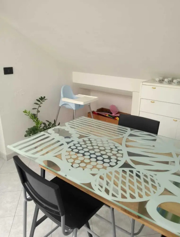 Spacious and Naturally Bright Bomboniera Rooftop Favors Apartment
