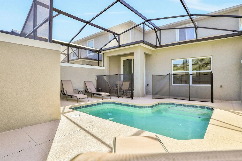 Updated Townhome With an Enclosed Pool, Five Bedrooms, W/D - Close to Everything
