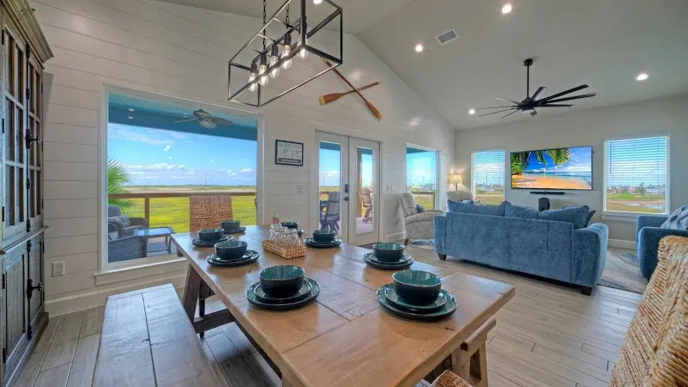 Bayfront Home w/ Pool, Game Room + Walk to Beach & Golf Cart Access Pelicans Perch by Avantstay