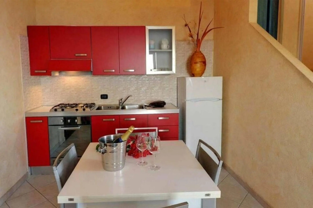 Apartment in Cannegione with communal terrace
