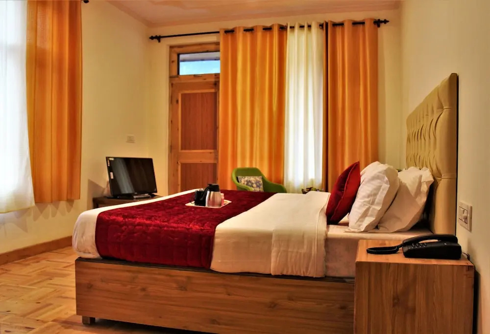 Valley Of Sublime!!! NIRVANA HILLS!!! A family Hotel with Roof Top Lounge!!!Balcony Rooms!!!Power Backup!!! Parking!!!400m Away From Mata Hadimba Temple