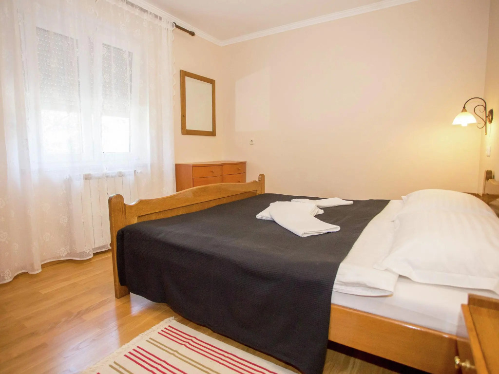 Nicely furnished apartment with covered terrace, located in front of the pool
