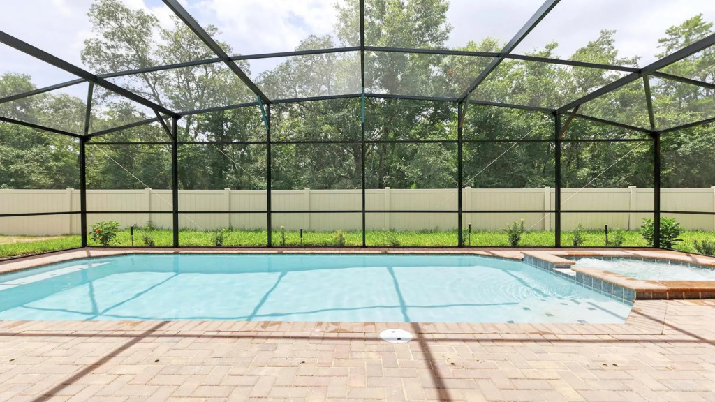 Stunning 9BR Villa w South-facing Pool Near Disney