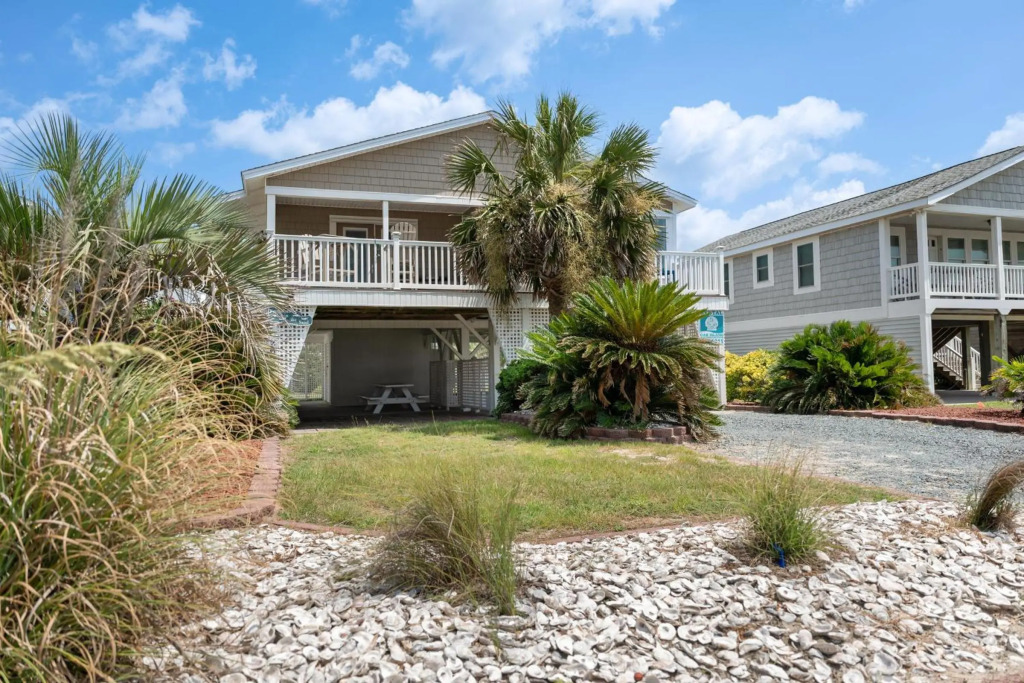 Footprints In The Sand by Oak Island Accommodations