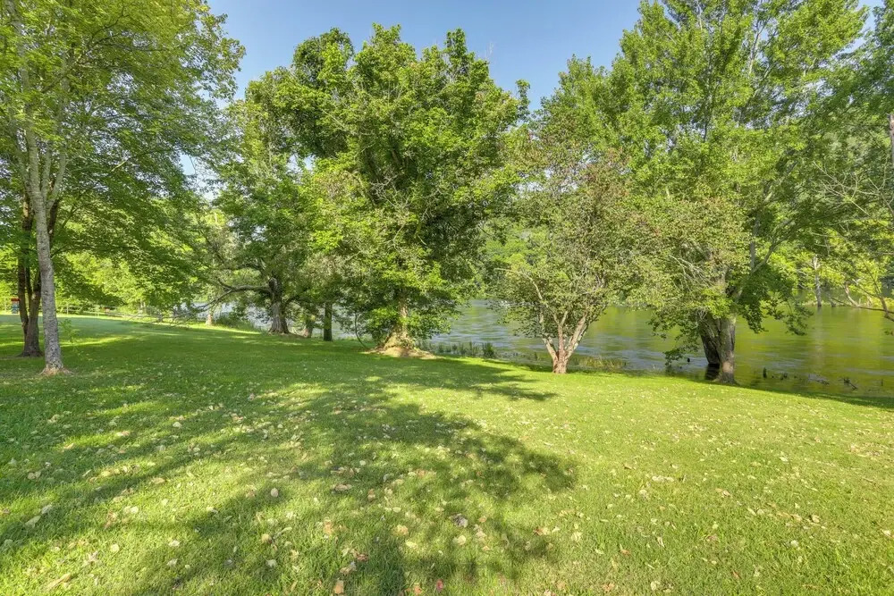 Riverfront Home w/ Porches & Views in Cotter!