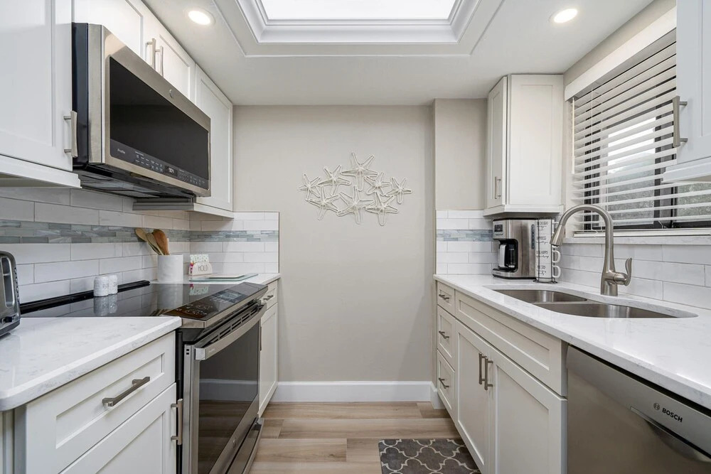 Caper Beach Club # 212 - 2810 Estero Blvd by Coastal Vacation Properties
