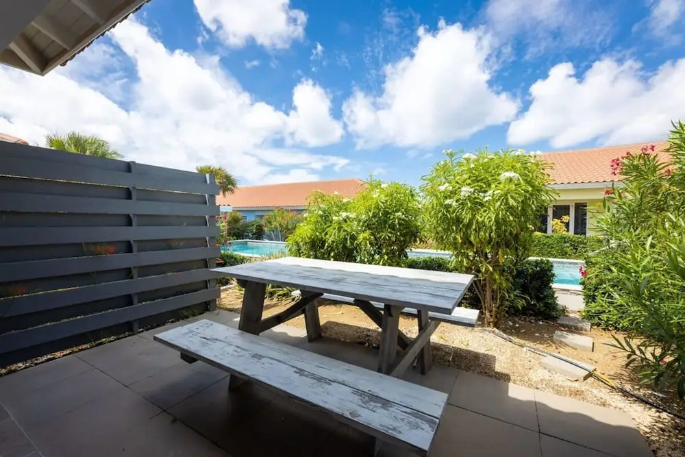 Charming 2BR Apt With Tropical Garden Pool