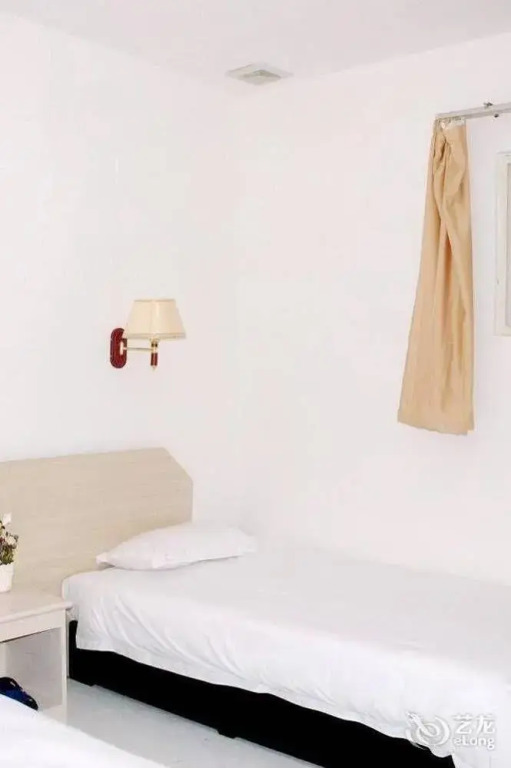 Qingdao Xiaogangwan Business Hotel