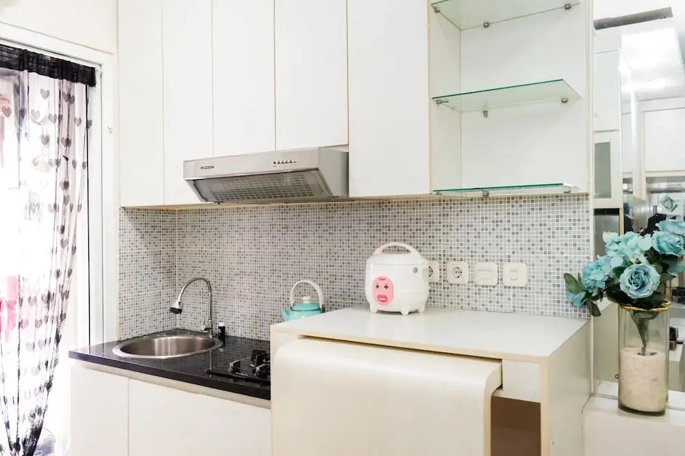 Homey 1BR with City View at Green Pramuka Apartment By Travelio