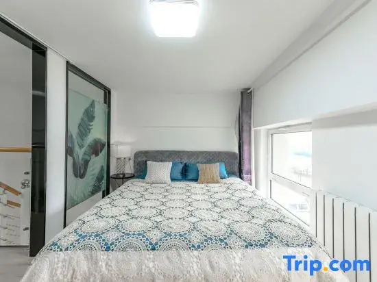 Mu'en Loft Light Luxury Apartment (Qingdao North Railway Station)