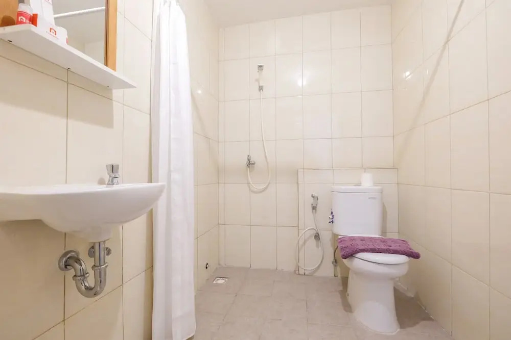 Spacious 2 Bedroom at Bassura City Apartment By Travelio