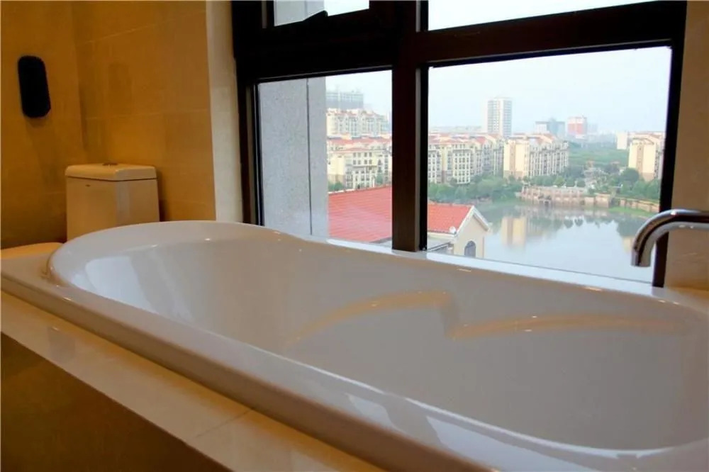 Vienna Hotel Xinyang Pingqiao Century Plaza Store