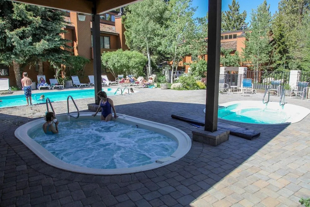 Snowflower 68 Spacious End Unit With Great Complex Amenities, Quiet Location by RedAwning