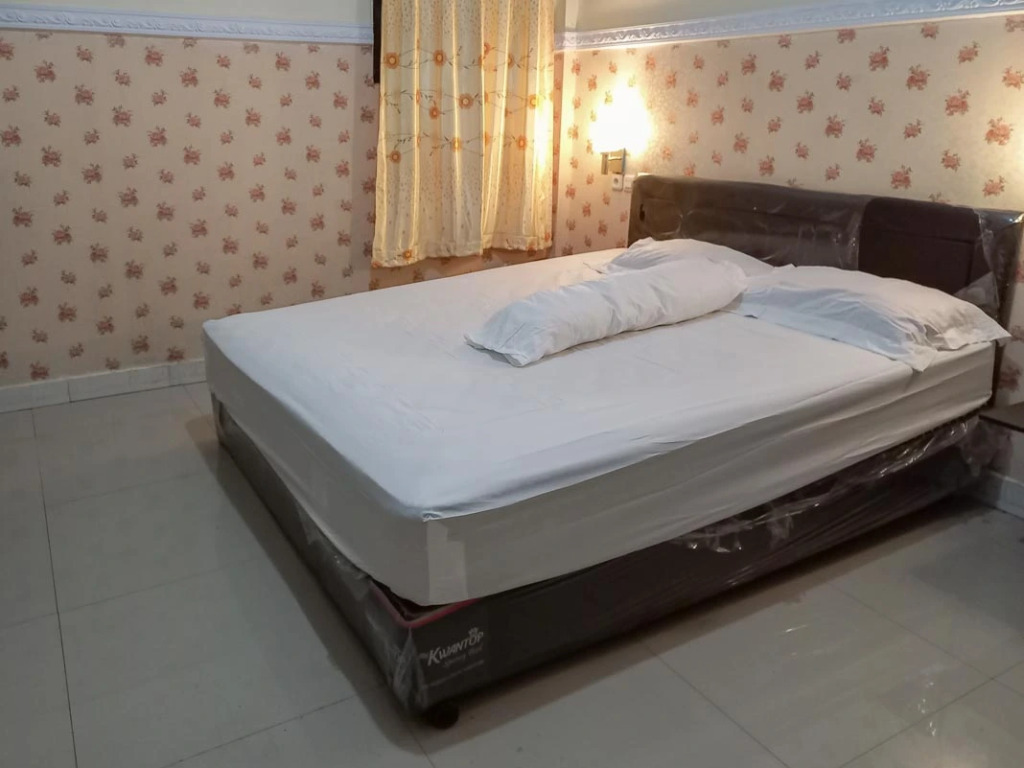 Homestay Singgasana Mitra RedDoorz