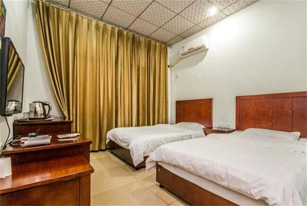 Yibin Meilun Business Hotel