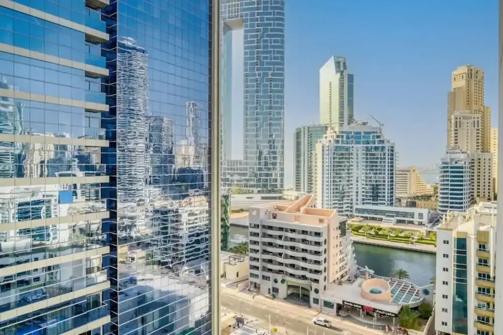 Bright Studio With Mesmerizing Canal And City View