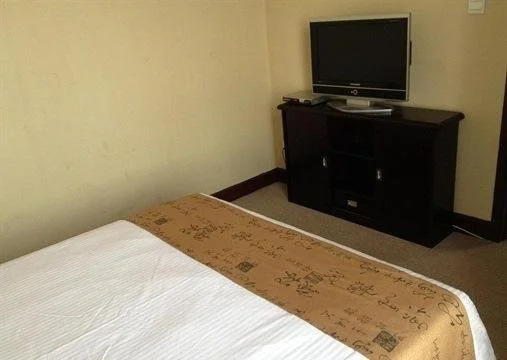 Baolong Homelike Hotel (Luojing Branch)