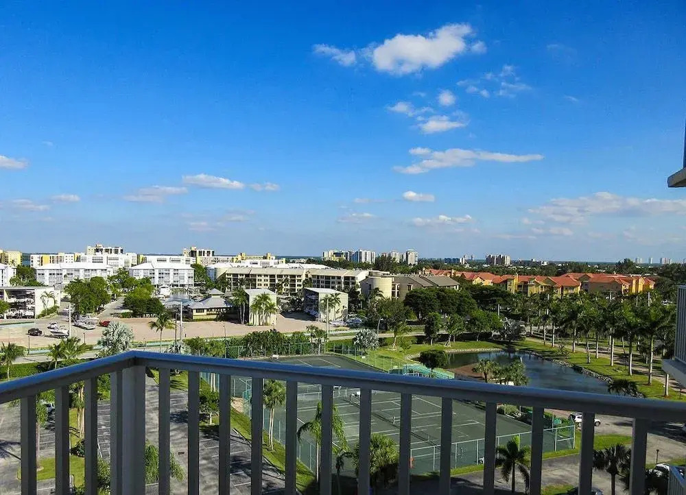 Estero Beach & Tennis #801A by RedAwning