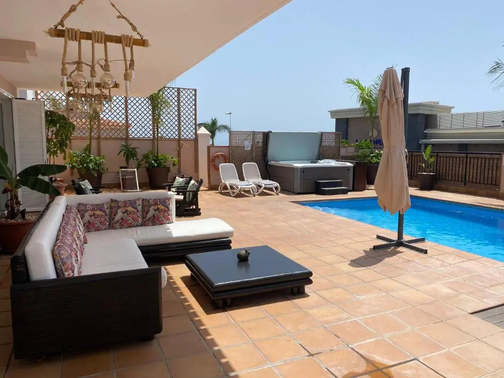 VILLA BLOSSOM in the beautiful area of Puerto Santiago Tenerife with 5 bedrooms for up to 10 guests private swimming pool and many other activities to entertain the family Secure parking for 2 cars and disabled access throughout
