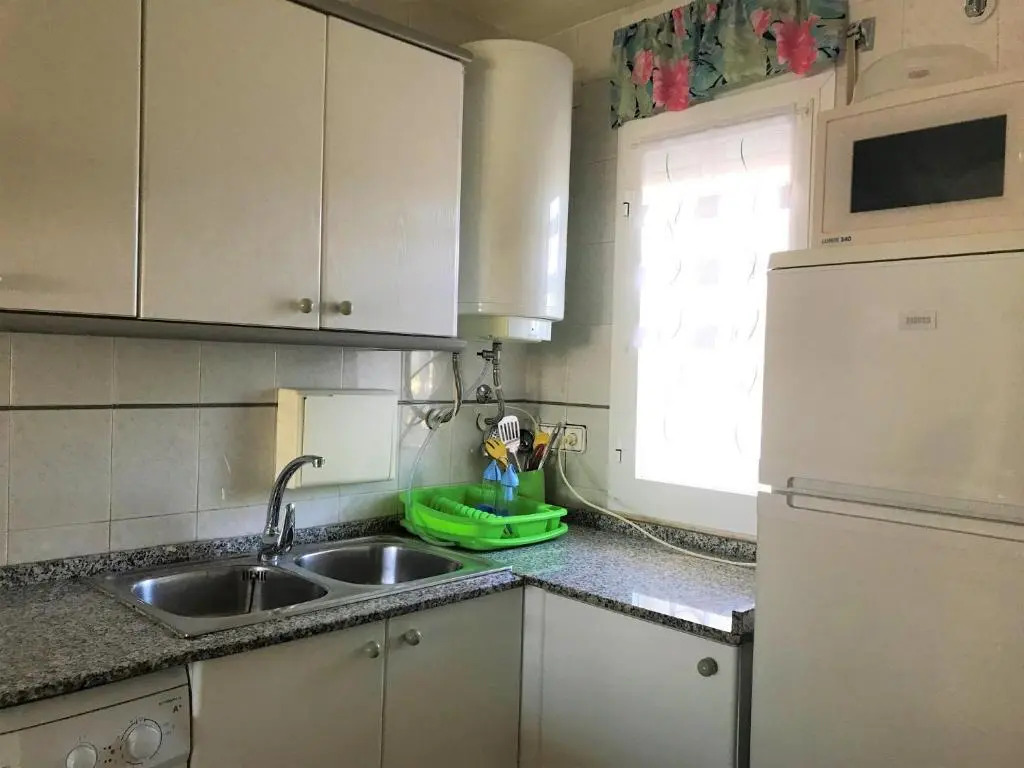 ático con barbacoa, piscina y parking 133B - INMO22
