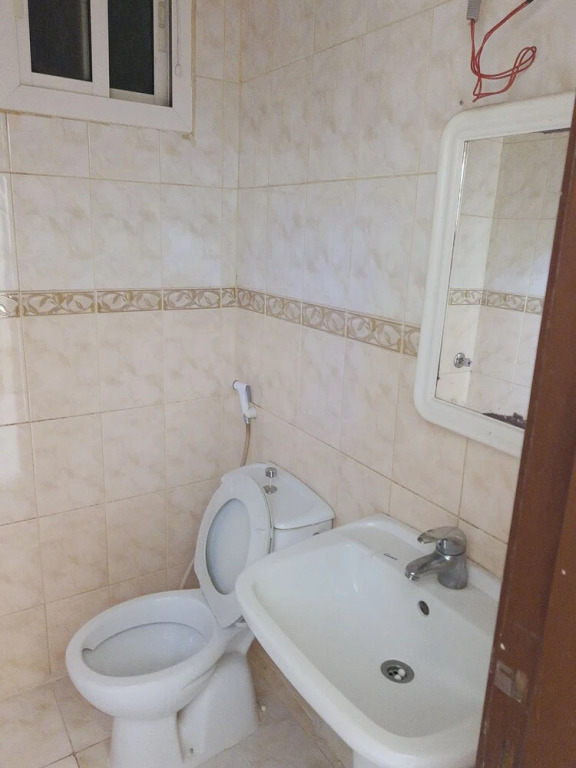 OYO 524 Zahrat Alwaziriya Furnished Apartments