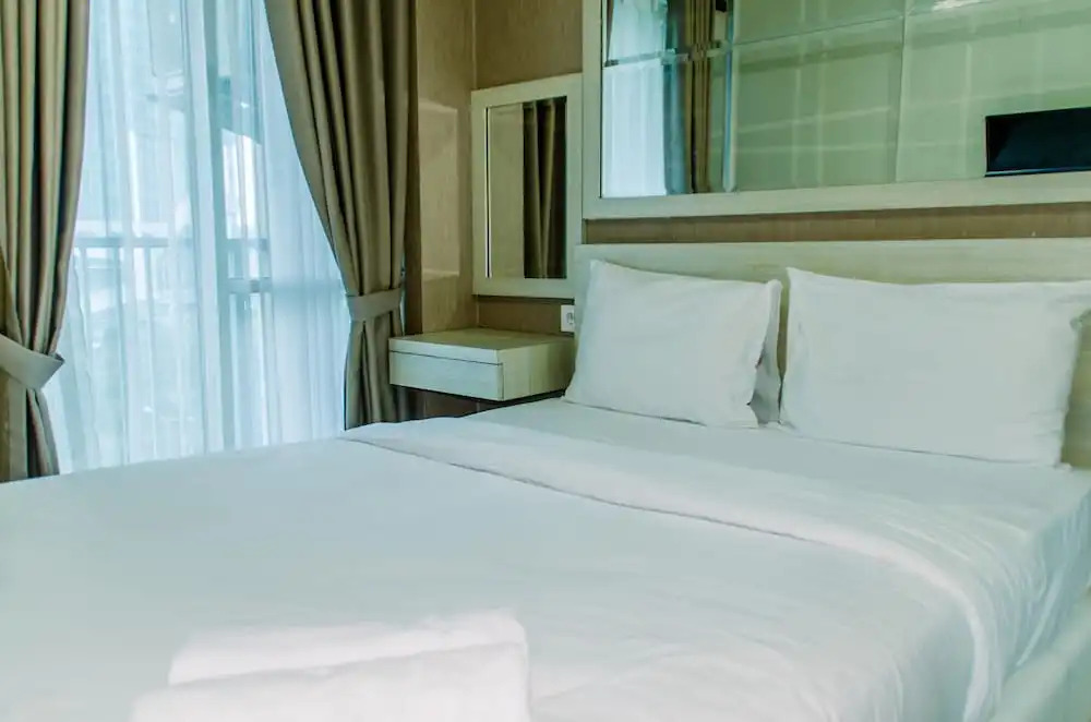 Homey And Warm Studio Room At Tifolia Apartment