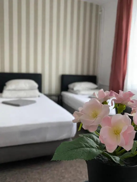 Pastel Guest Rooms