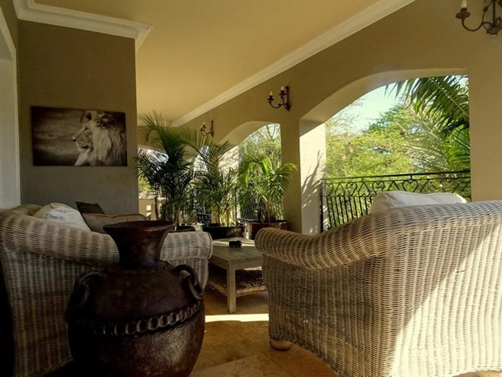 African Palm Cottage and Guesthouse